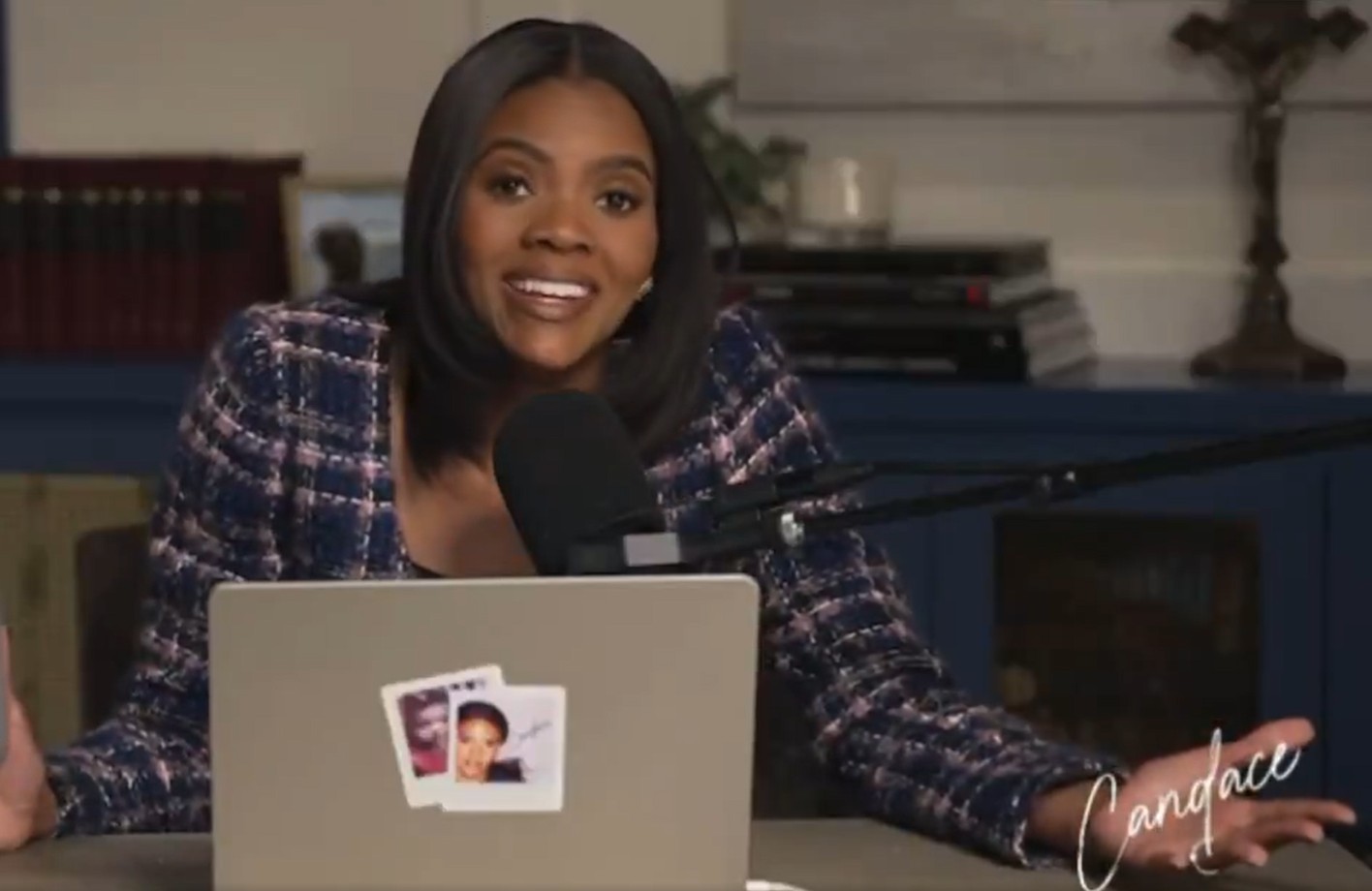 Candace Owens in front of a laptop computer