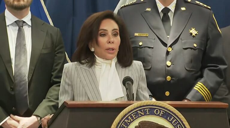 Jeanine Pirro speaking at a podium