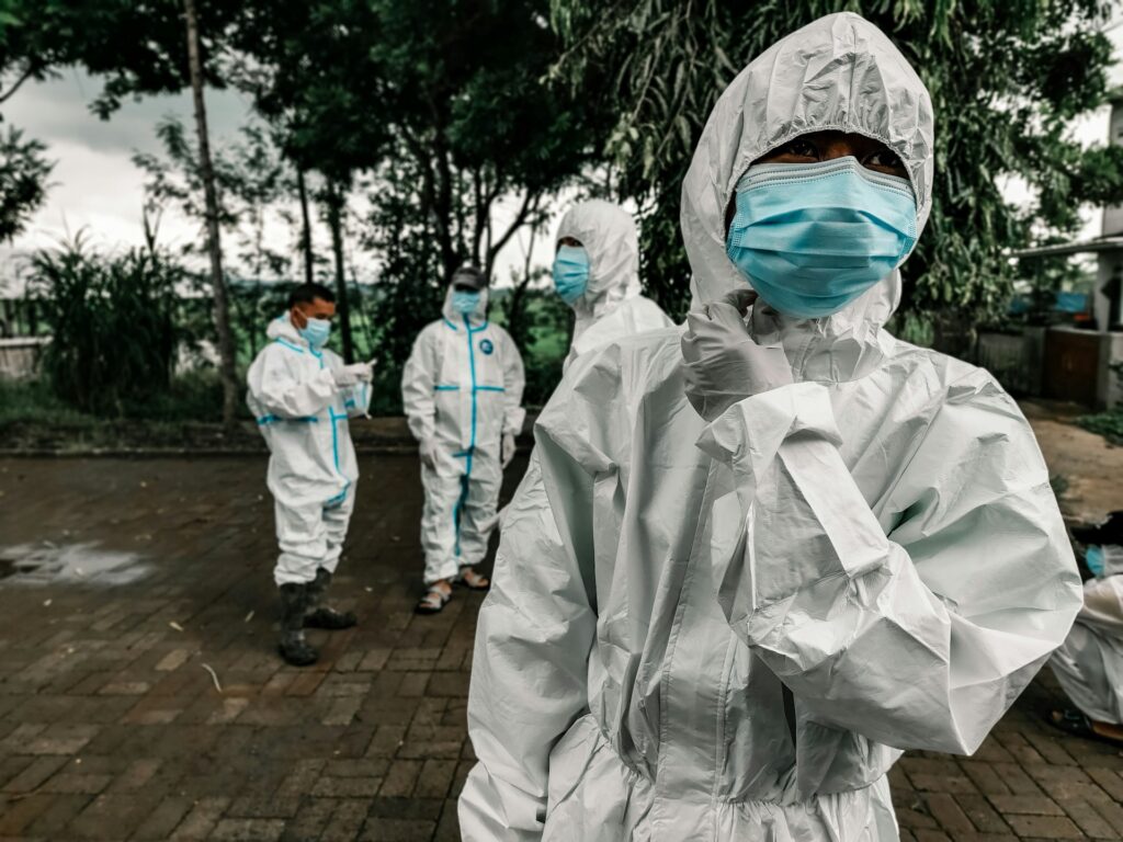 People dressed in hazmat suits