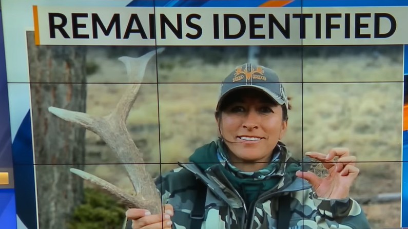 Woman wearing camo with text saying Remains Identified