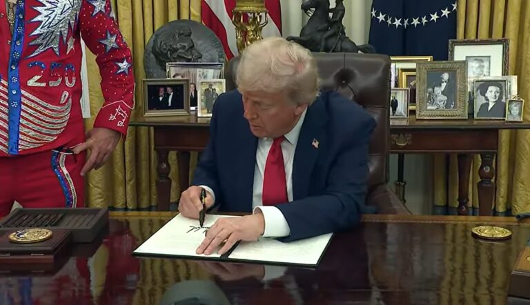 President Trump signing an order